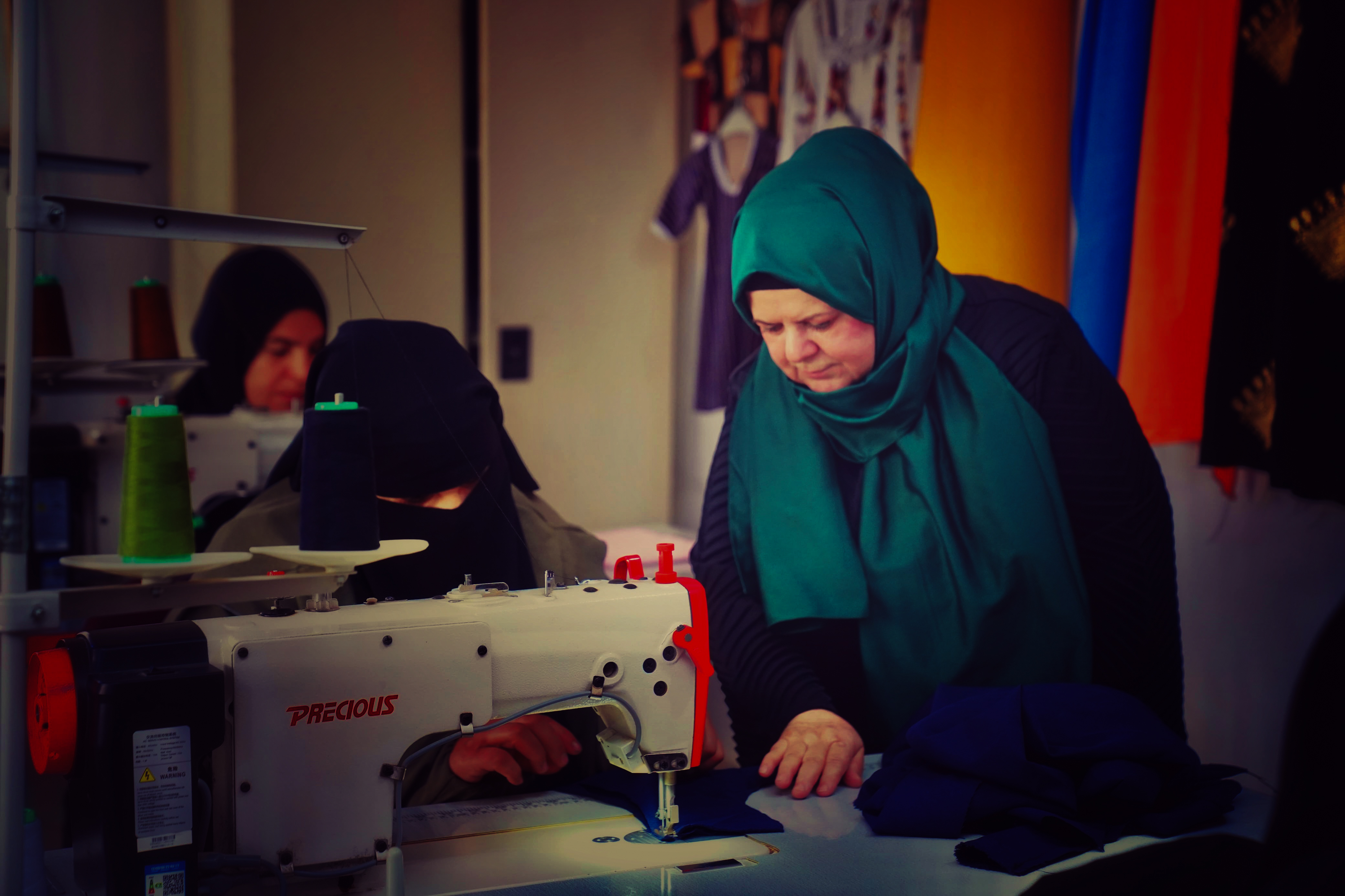 Mother in sewing training